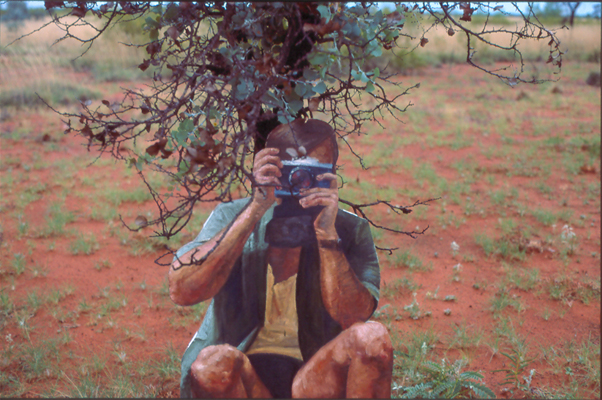 shooting the natives in situ cut-out life-sized figure, farmland opposite native land, pilbara region